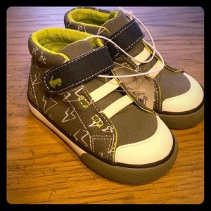 Little tike shoes with lightning bolts.